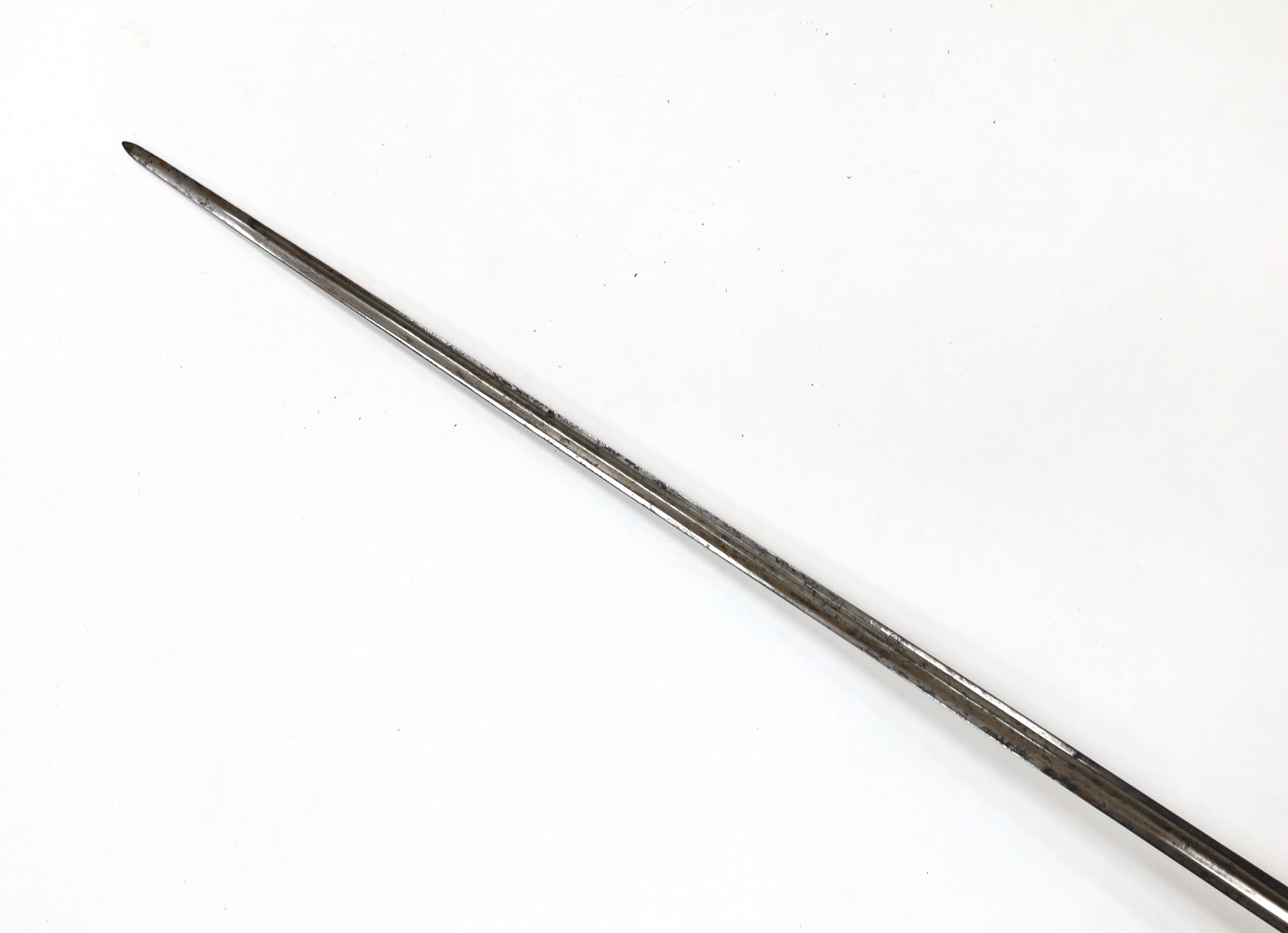 An English iron hilted small sword, c.1765, chiselled and pierced with scrolling devices and foliage, silver gilt tape and silver wire bound grip, colichemarde blade etched with scrolls and squirrel, blade 81.5cm